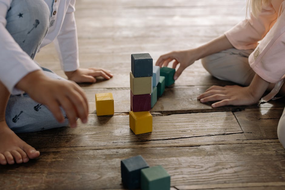 toddlers playing together blocks colorful classroom social learning