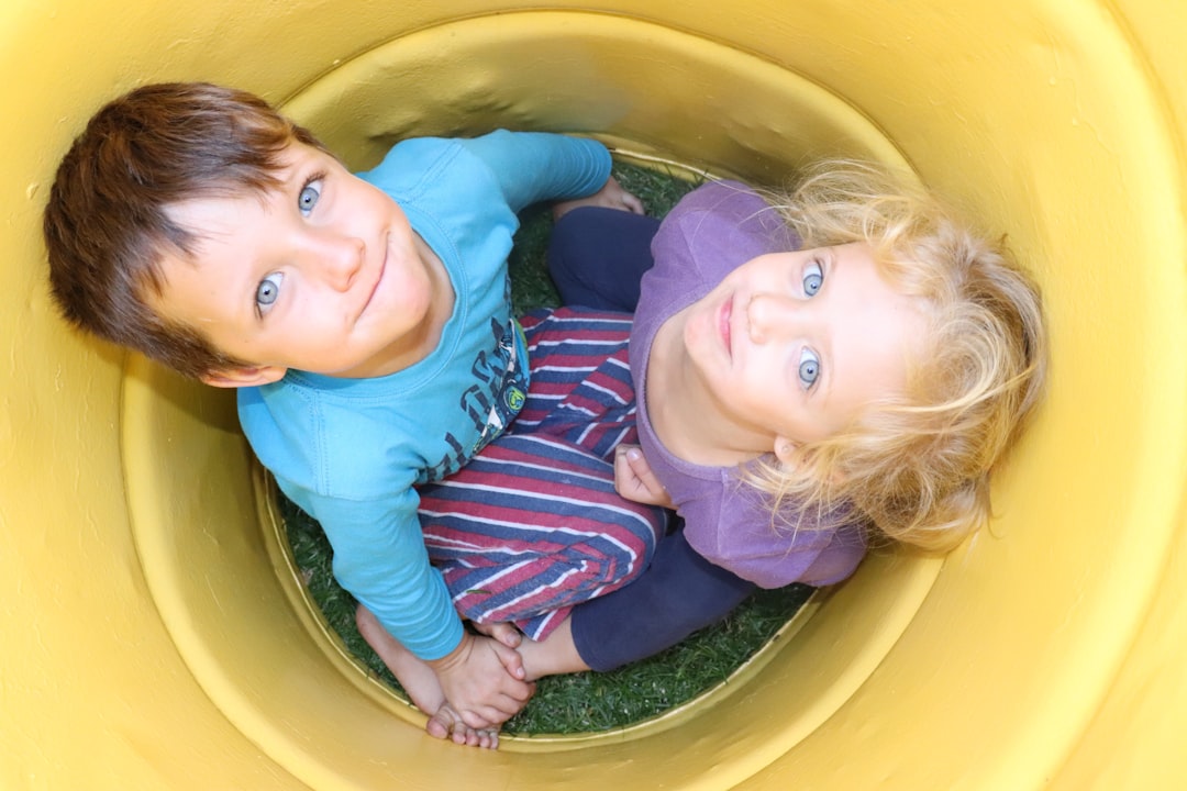 siblings playing together children psychology development