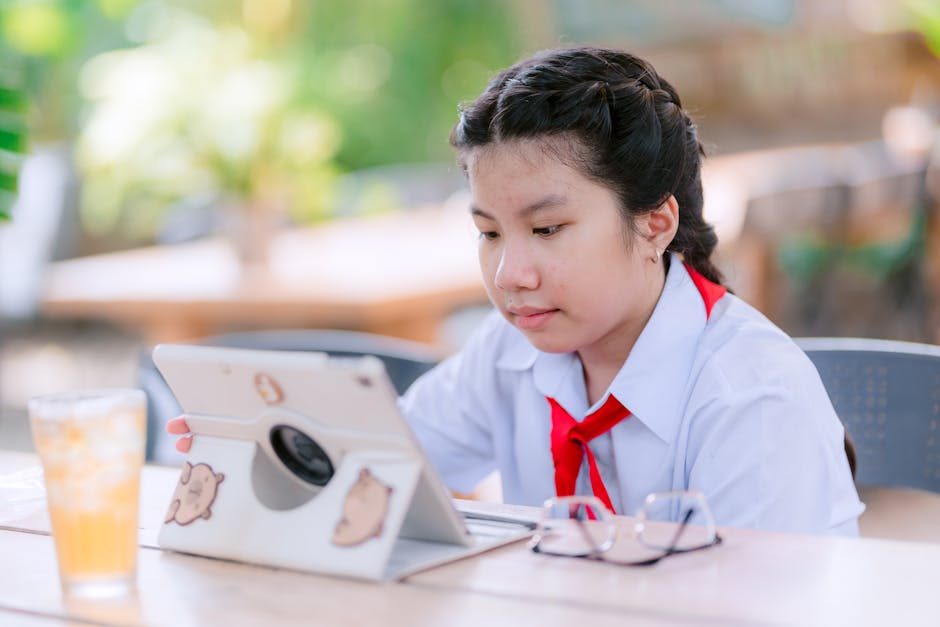 global edtech students learning tablet AI adaptive 2026