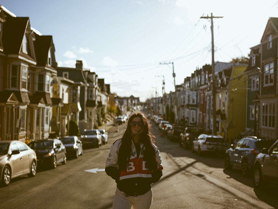 solo traveler safety tips, woman backpacking city street
